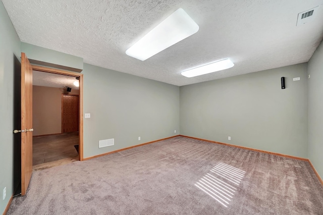 4630 Eagle Ridge Rd, Lincoln, NE 68516 - carpeted spare room featuring a textured ceiling and baseboards