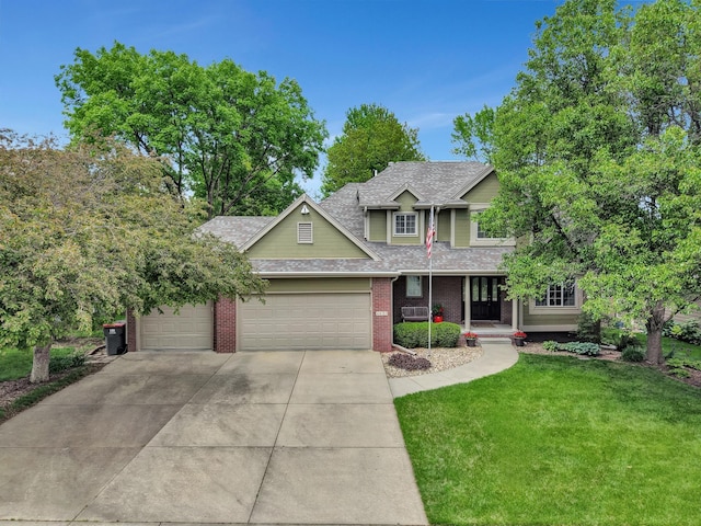 4630 Eagle Ridge Rd, Lincoln, NE 68516 - view of front of house with driveway, a front lawn, roof with shingles, a garage, and brick siding