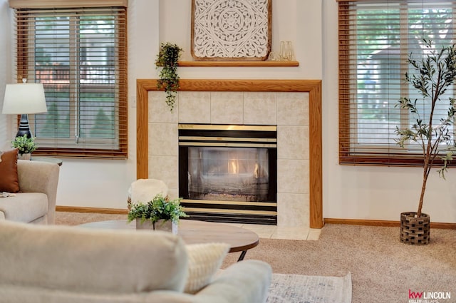 4630 Eagle Ridge Rd, Lincoln, NE 68516 - living room with carpet floors and a tile fireplace