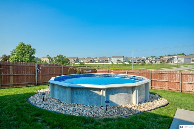 7342 S 184th St, Omaha, NE 68136 - view of pool with a residential view and a fenced backyard