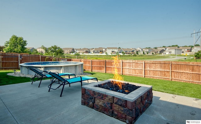 7342 S 184th St, Omaha, NE 68136 - fenced backyard featuring a fire pit, a residential view, and a patio area