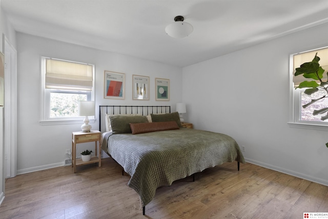 622 S 126th St, Omaha, NE 68154 - bedroom with wood finished floors and baseboards