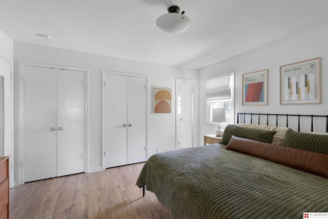 622 S 126th St, Omaha, NE 68154 - bedroom featuring two closets and wood finished floors