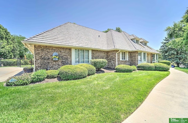 9706 Ascot Dr, Omaha, NE 68114 - view of front facade with brick siding