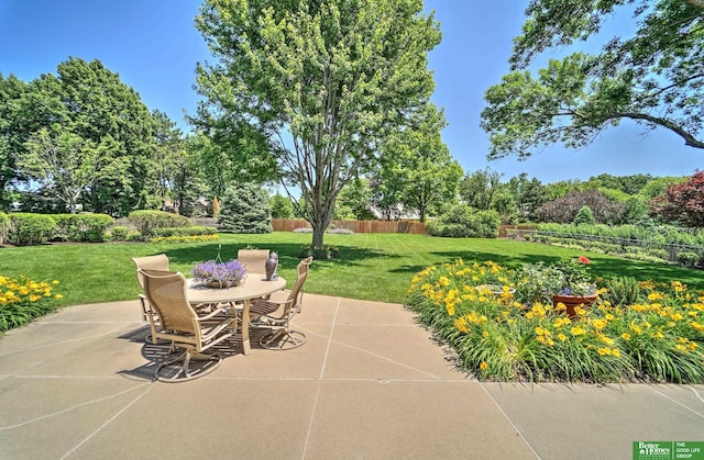 9706 Ascot Dr, Omaha, NE 68114 - view of patio / terrace featuring outdoor dining area