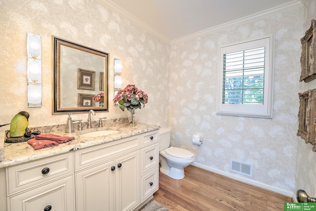 9706 Ascot Dr, Omaha, NE 68114 - bathroom with wood finished floors, ornamental molding, and vanity