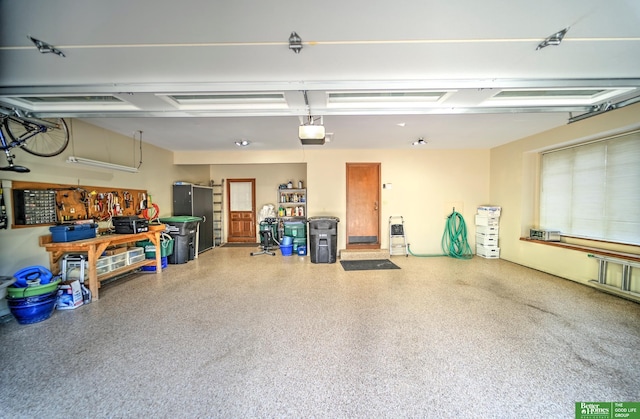 9706 Ascot Dr, Omaha, NE 68114 - garage featuring a garage door opener