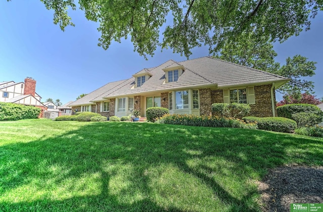 9706 Ascot Dr, Omaha, NE 68114 - view of front of property with a front lawn and brick siding