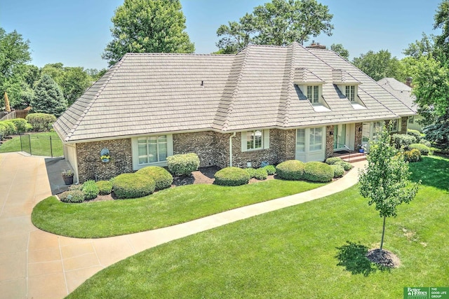 9706 Ascot Dr, Omaha, NE 68114 - view of front facade with brick siding, concrete driveway, and a tile roof