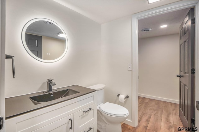 801 Redwood Ln, Papillion, NE 68046 - half bath with vanity and wood finished floors