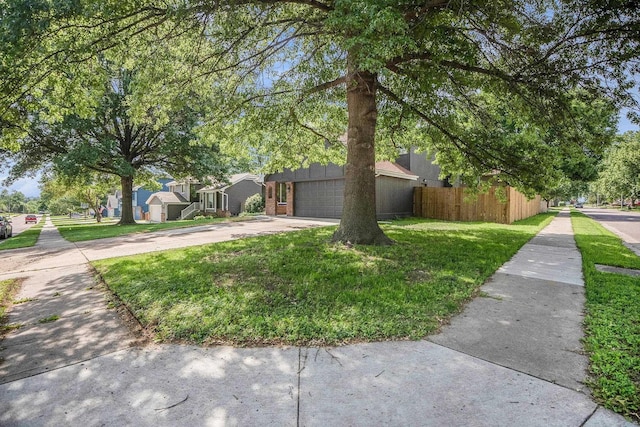 801 Redwood Ln, Papillion, NE 68046 - view of front of property with a garage and concrete driveway