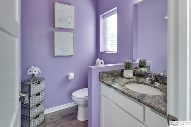 7163 N 164th St, Bennington, NE 68007 - bathroom featuring vanity and wood finished floors