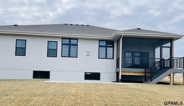 20506 Boulder St, Gretna, NE 68028 - rear view of house with a sunroom, a lawn, and stairway