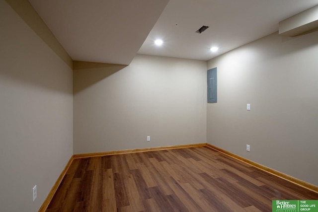 16712 Gold St, Omaha, NE 68130 - spare room with electric panel, wood finished floors, and recessed lighting