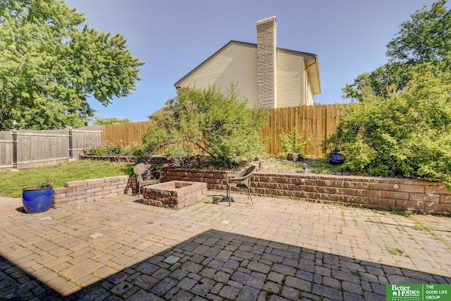 16712 Gold St, Omaha, NE 68130 - fenced backyard featuring a patio