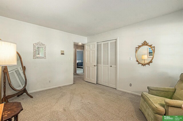 1729 S 76th Ave, Omaha, NE 68124 - living area with light carpet and baseboards