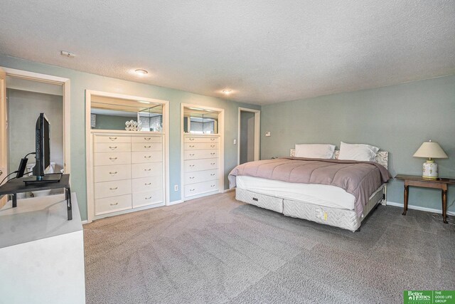 1729 S 76th Ave, Omaha, NE 68124 - bedroom featuring a textured ceiling and carpet flooring