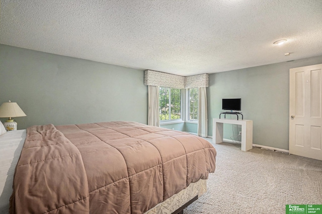 1729 S 76th Ave, Omaha, NE 68124 - bedroom featuring carpet floors and a textured ceiling