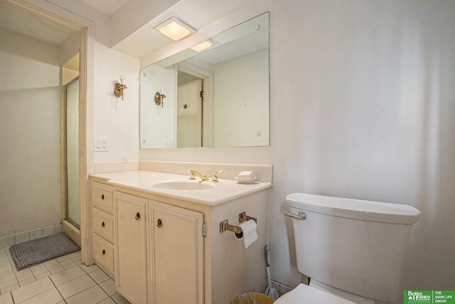 1729 S 76th Ave, Omaha, NE 68124 - full bathroom featuring vanity, tile patterned flooring, and a stall shower