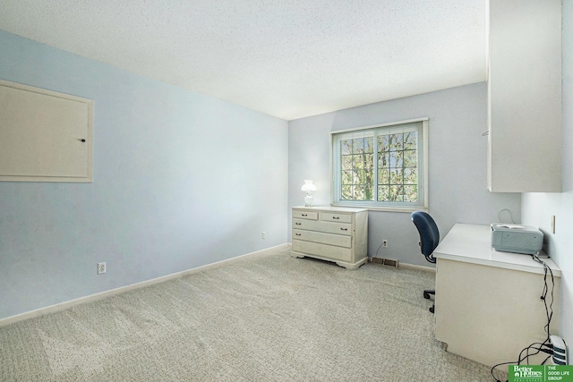 1729 S 76th Ave, Omaha, NE 68124 - home office featuring light colored carpet and a textured ceiling