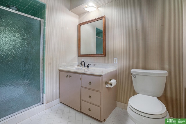1729 S 76th Ave, Omaha, NE 68124 - full bathroom featuring tile patterned flooring, a stall shower, and vanity