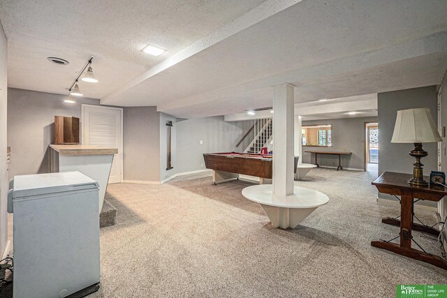 1729 S 76th Ave, Omaha, NE 68124 - recreation room featuring carpet, billiards table, track lighting, and a textured ceiling