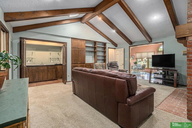 1729 S 76th Ave, Omaha, NE 68124 - living room with light colored carpet, a textured ceiling, and recessed lighting