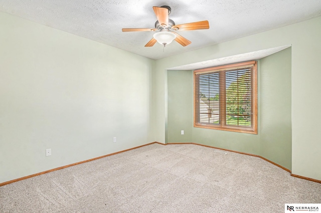 4209 N 158th Ave, Omaha, NE 68116 - carpeted empty room featuring a ceiling fan and a textured ceiling