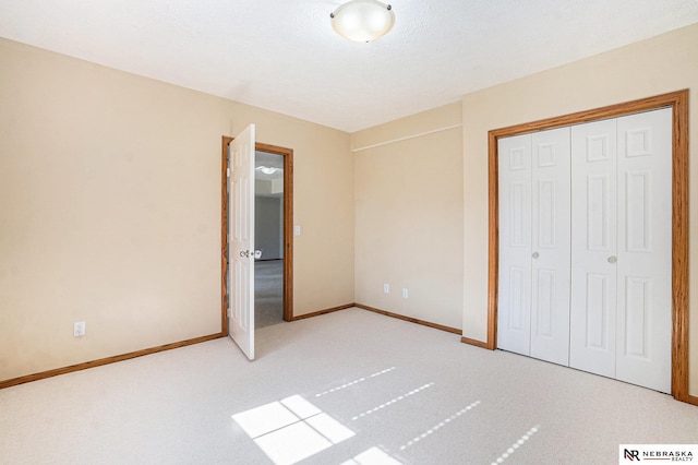 4209 N 158th Ave, Omaha, NE 68116 - unfurnished bedroom featuring carpet flooring and a closet