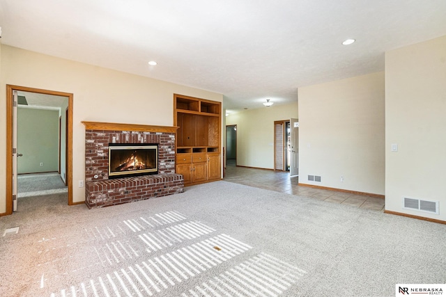 4209 N 158th Ave, Omaha, NE 68116 - unfurnished living room featuring carpet, a fireplace, and recessed lighting