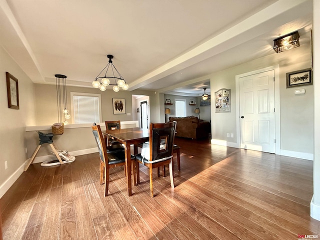 26855 SW 89th Rd, Beatrice, NE 68310 - dining area featuring a chandelier and wood-type flooring