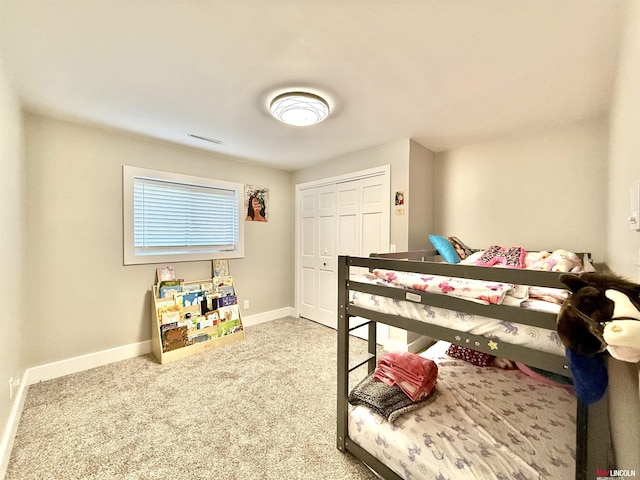 26855 SW 89th Rd, Beatrice, NE 68310 - carpeted bedroom with baseboards and a closet