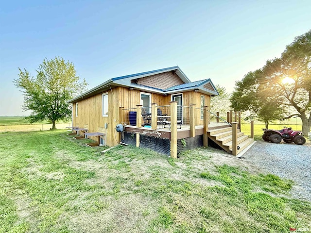 26855 SW 89th Rd, Beatrice, NE 68310 - rear view of house featuring a yard and a deck