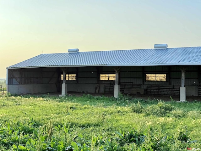 26855 SW 89th Rd, Beatrice, NE 68310 - property exterior at dusk featuring a metal roof and an outdoor structure