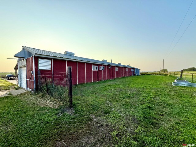 26855 SW 89th Rd, Beatrice, NE 68310 - yard at dusk featuring an outbuilding