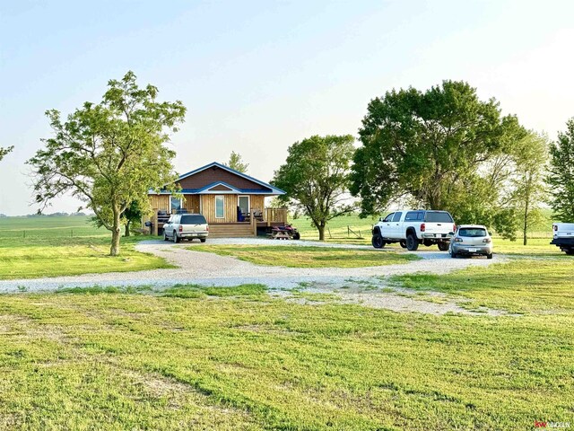 26855 SW 89th Rd, Beatrice, NE 68310 - view of green lawn featuring driveway