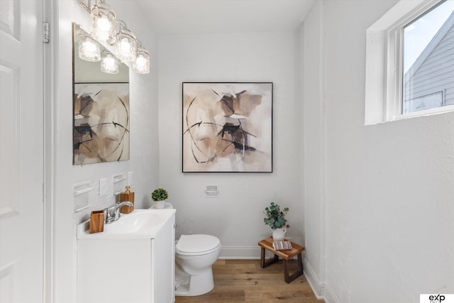 3102 Woolworth Ave, Omaha, NE 68105 - bathroom featuring vanity and wood finished floors
