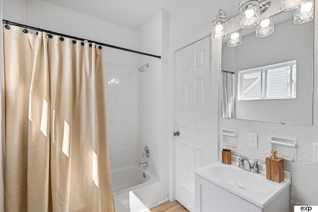 3102 Woolworth Ave, Omaha, NE 68105 - bathroom with vanity, shower / tub combo, and a textured wall