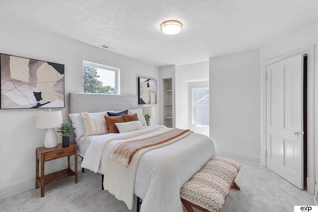 3102 Woolworth Ave, Omaha, NE 68105 - bedroom featuring carpet floors and baseboards
