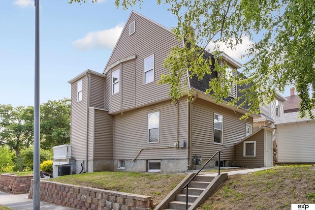 3102 Woolworth Ave, Omaha, NE 68105 - view of home's exterior with a central AC unit