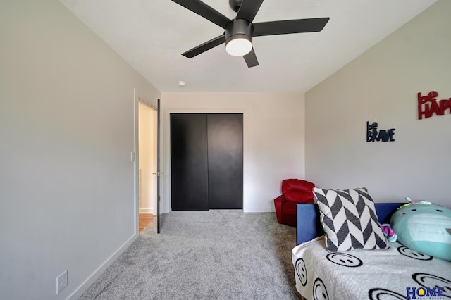 1991 Calvert St, Lincoln, NE 68502 - bedroom with carpet flooring, a closet, and ceiling fan