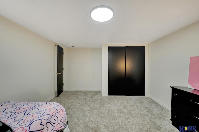 1991 Calvert St, Lincoln, NE 68502 - bedroom featuring carpet and a closet