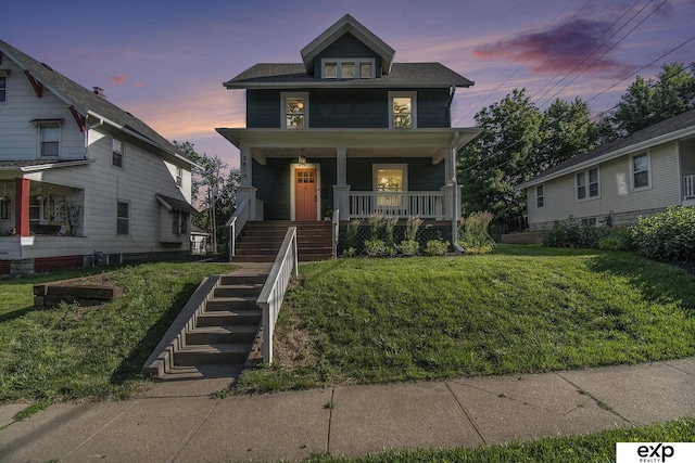 3814 Marcy St, Omaha, NE 68105 - american foursquare style home with stairs, a lawn, and covered porch