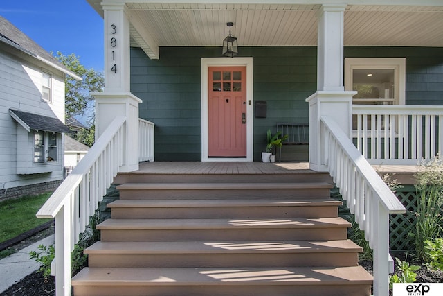 3814 Marcy St, Omaha, NE 68105 - doorway to property with a porch