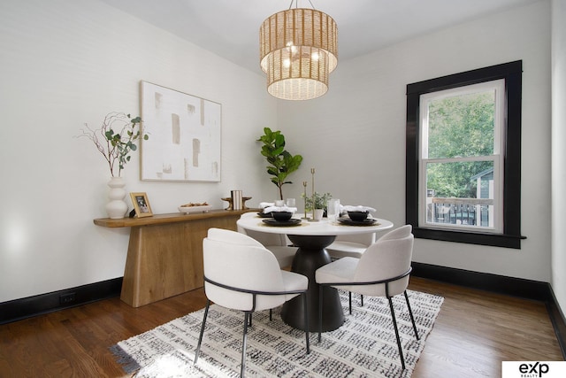3814 Marcy St, Omaha, NE 68105 - dining area with a chandelier and dark wood-type flooring