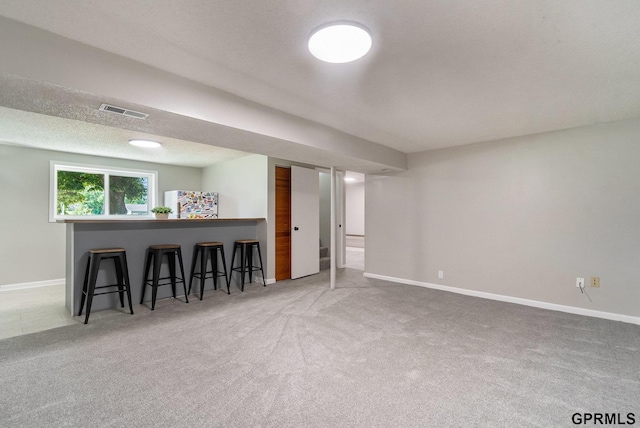 4005 N 213th Cir, Omaha, NE 68022 - basement with carpet flooring and freestanding refrigerator