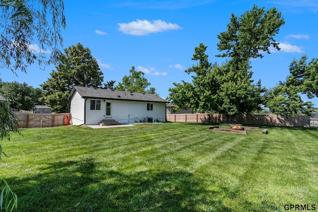 4005 N 213th Cir, Omaha, NE 68022 - fenced backyard with entry steps and a patio area