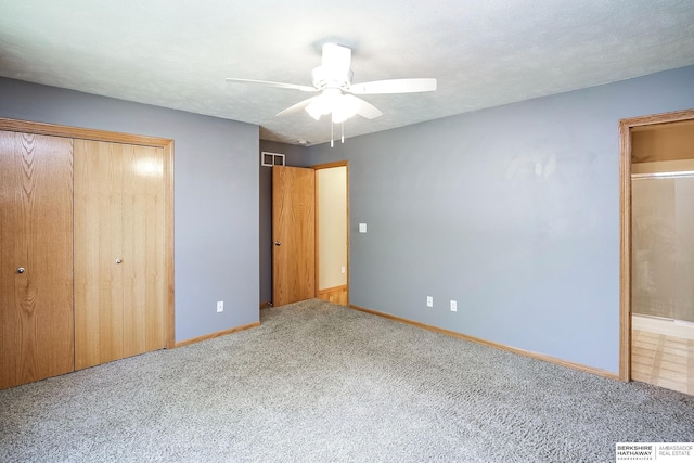 21305 Mcclellan Cir, Gretna, NE 68028 - unfurnished bedroom featuring carpet, a closet, ceiling fan, and ensuite bath