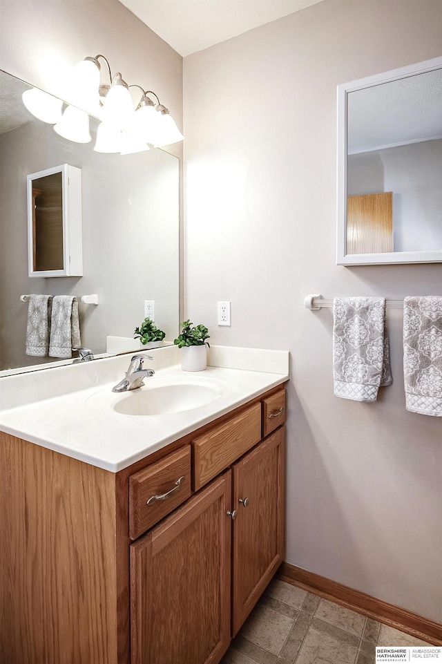 21305 Mcclellan Cir, Gretna, NE 68028 - bathroom with vanity and baseboards