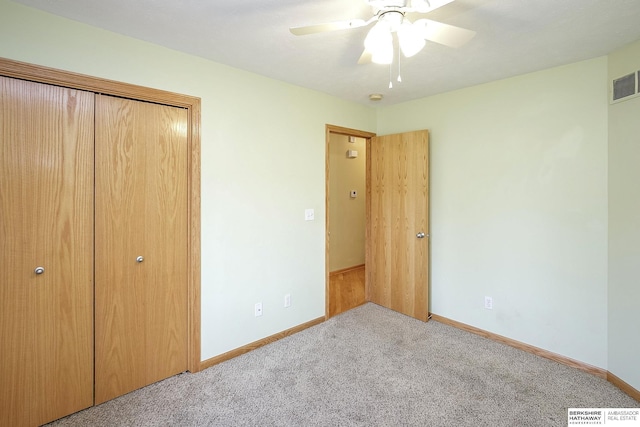 21305 Mcclellan Cir, Gretna, NE 68028 - unfurnished bedroom with carpet flooring, a closet, and ceiling fan